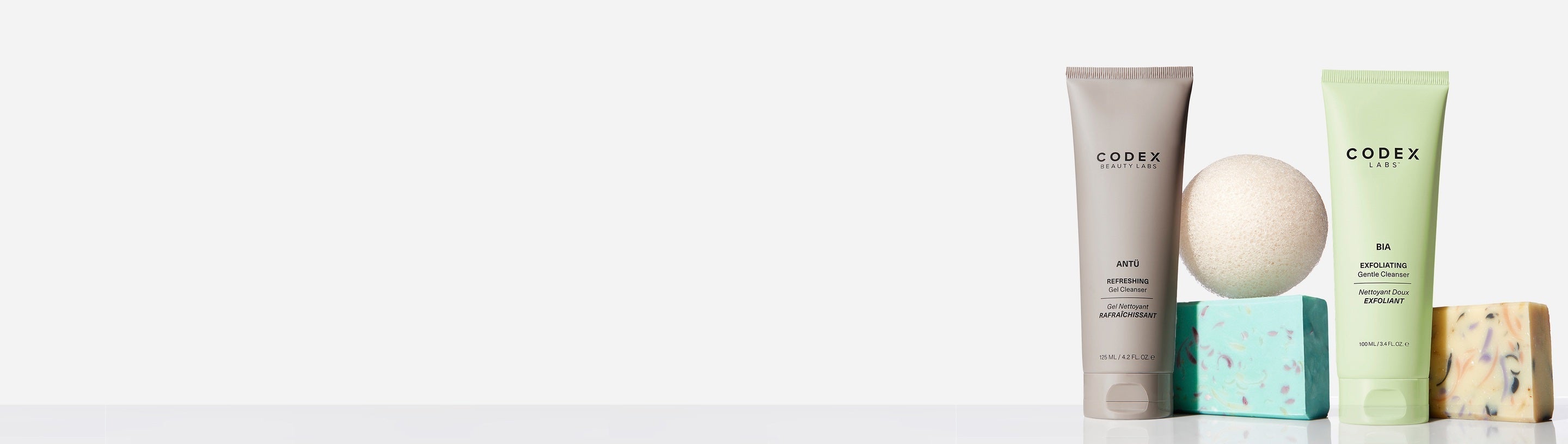 Codex Labs soaps and skin creams on a light grey background.