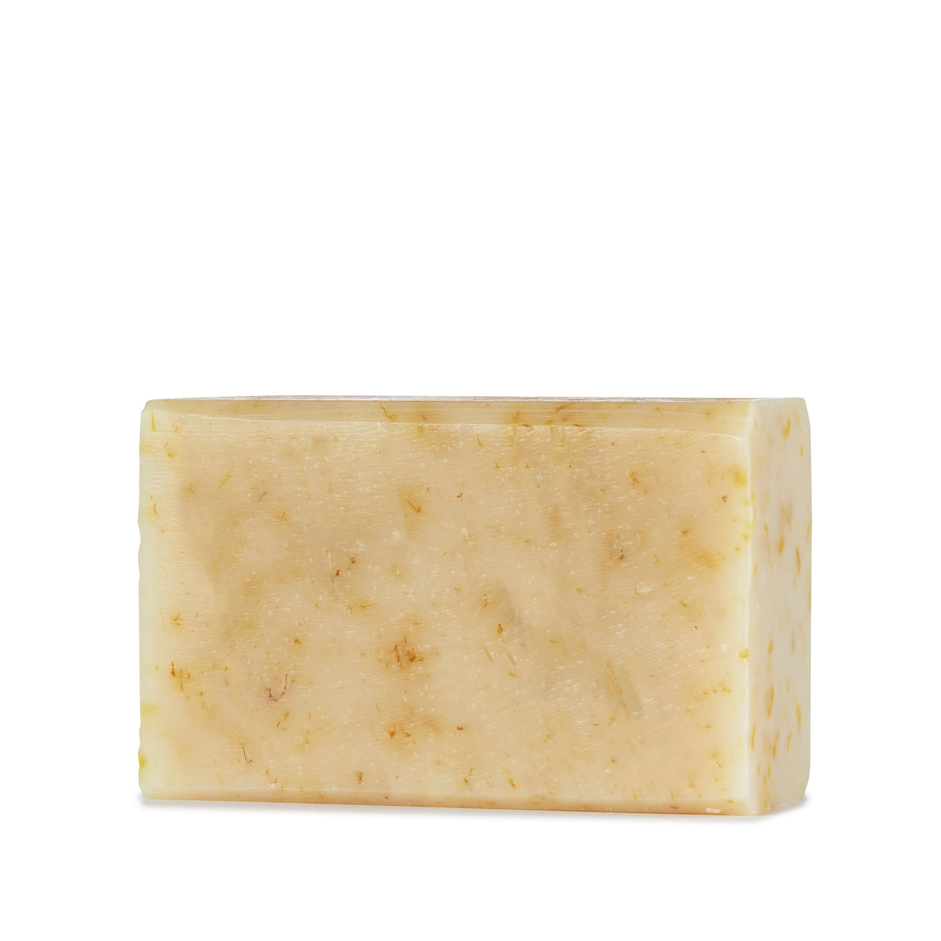 Bar of soap with a textured surface on a white background